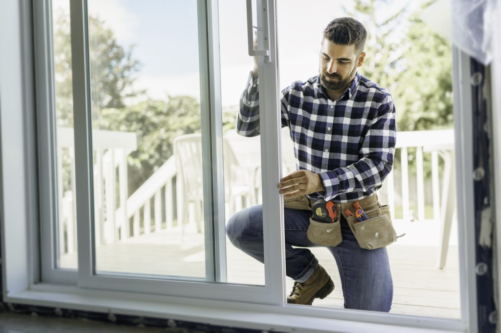 Ridley window installer completing a residential project